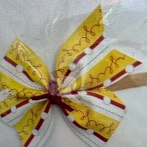 Yellow and Red Decorative Party Bow